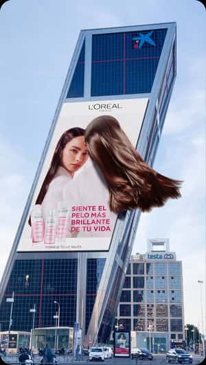L'Oréal Paris Elvive at CaixaBank Tower fake-out-of-home ad of L'Oréal Paris