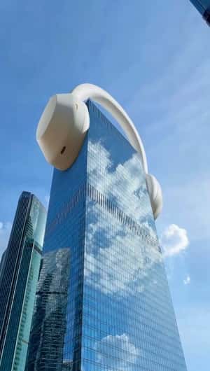 Skyscraper Wearing Headphones in fake-out-of-home ad of Technopark