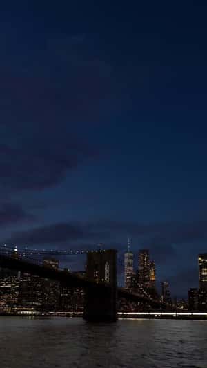 Fireworks over Manhattan Bridge fake-out-of-home ad of Maybelline New York