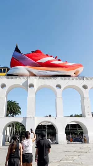 Running Shoes Cruising on Railway in a fake-out-of-home-ad of Adidas