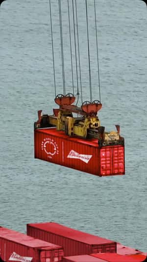Shipping Containers Loaded by Crane in fake-out-of-home ad of Budweiser