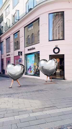 Heart Charms Walks in fake-out-of-home ad of Pandora