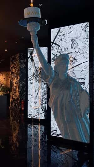 Statue of Liberty Emerge from Scribble Display in a fake-out-of-home-ad of Amaya
