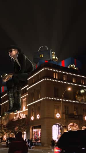 Giant Woman Model Sits in fake-out-of-home ad of Ralph Lauren
