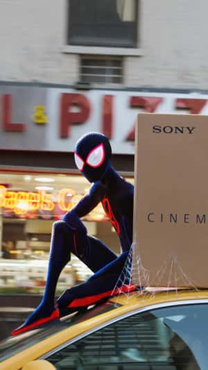 Spider-Man Rides Above Taxi in fake-out-of-home ad of Sony