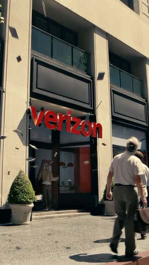 Flying Smartphones Above City Street in fake-out-of-home ad of Verizon
