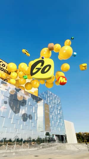 Floating Yellow Balloons in fake-out-of-home ad of Yandex Go