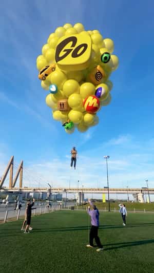 Balloon Stunt Lifts Man in fake-out-of-home ad of Yandex Go