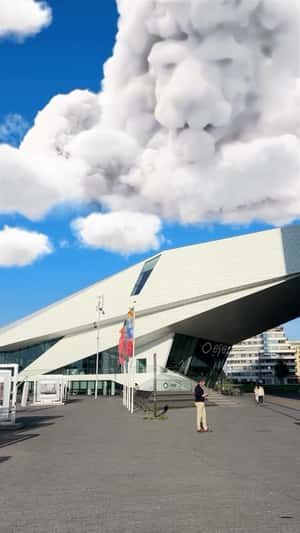 Mufasa Cloud Forms Above Building in fake-out-of-home ad of Disney Studios
