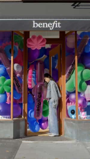 Mascara Balloons Float Outside the Store in a fake-out-of-home ad of Benefit Cosmetics