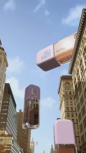 Foundation Bottles Drifts in a fake-out-of-home ad of Maybelline