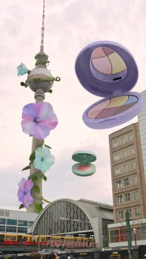 Foundation Bottle Carried By Helicopter r in fake-out-of-home promotional ad of Charlotte Tilbury