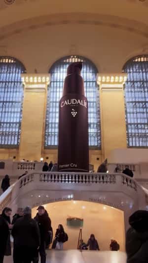 Serum Installation Above the Stairs in fake-out-of-home promotional ad of Caudalie