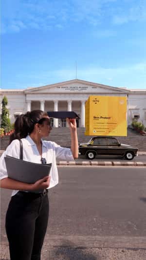Sunscreen Drink Box Above the Car in fake-out-of-home ad of Setu