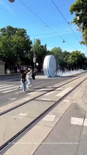 Container Rolls Like Wheel in fake-out-of-home ad of Skruf