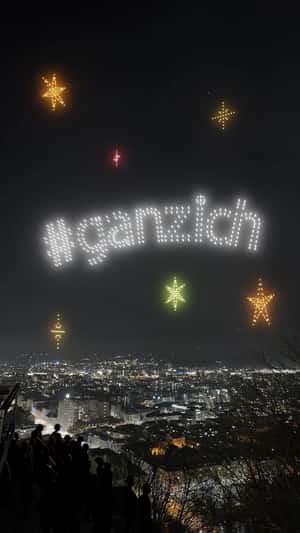 Rooftop Drone Light Show in fake-out-of-home ad of DM