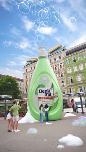 Dishwasher Release Bubbles in fake-out-of-home ad of DM