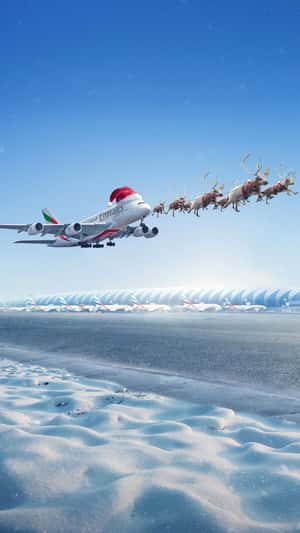 Airplane Sleigh Pulled by Reindeers in fake-out-of-home ad of Emirates