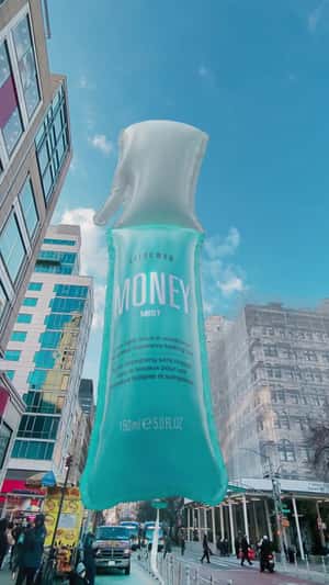 Color Wow Hair Money Mist giant balloon burst in Union Square fake-out-of-home ad of Sephora