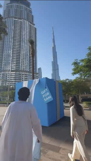 Blue Gift Box Unboxing in fake-out-of-home ad of Honor
