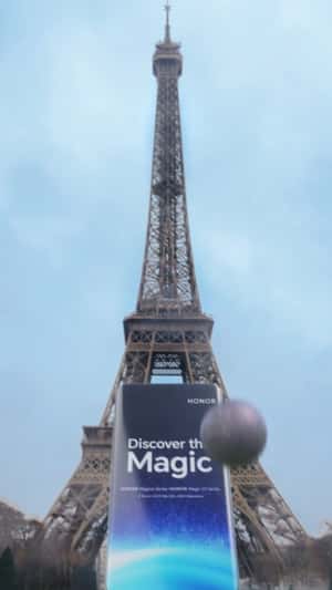 Smartphone Leaning on Eiffel Tower in Paris in fake-out-of-home ad of Honor