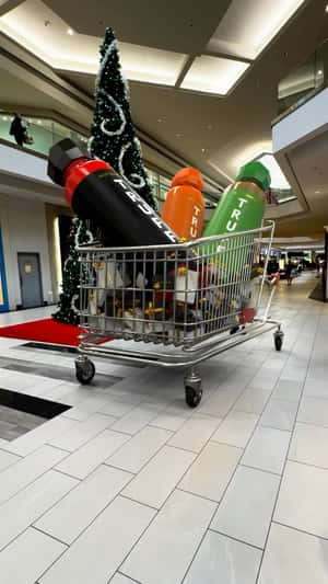Sauce Bottles Inside a Shopping Cart in fake-out-of-home ad of TRUFF
