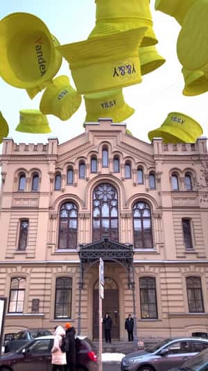 Floating Bucket Hats in fake-out-of-home ad of Yandex