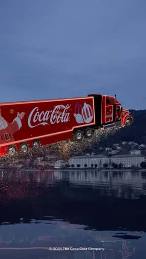 Christmas Truck Flies Across Austria in fake-out-of-home ad of Coca-Cola