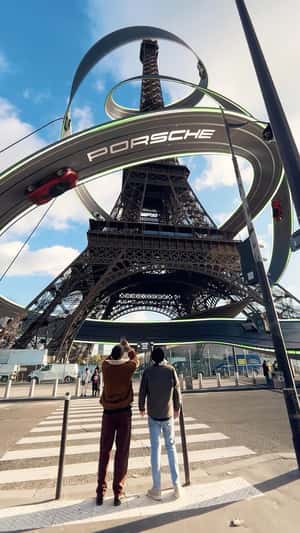 Taycan Roller Coaster Race in Eiffel Tower fake-out-of-home ad of Porsche 