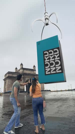 Phone Box Lifted By Claw in fake-out-of-home ad of OnePlus