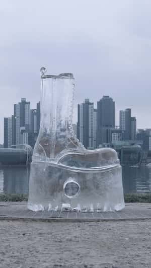 Giant Ice Boot Rises on the Riverside in fake-out-of-home ad of Balenciaga