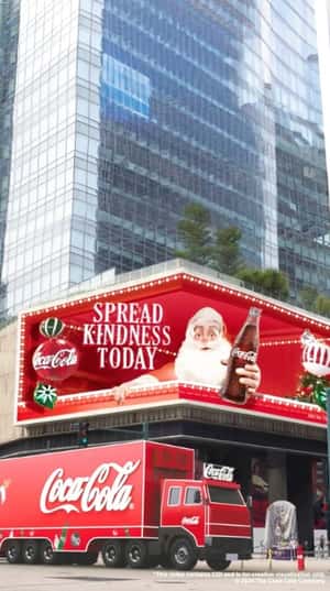 Truck Collects Gifts From LED Screen in a fake-out-of-home display of Coca-Cola