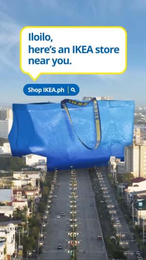 Blue Shopping Bag Stands on Highway in a fake-out-of-home ad of IKEA