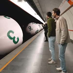 Lottery Balls Roll in Subway in a fake-out-of-home ad of Lotto