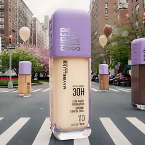 Foundation Carried by Balloons in a fake-out-of-home ad of Maybelline