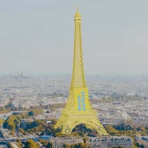 Eiffel Tower Turns Lemon Yellow Hue in a fake-out-of-home ad of Lemon Perfect