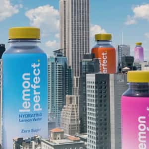 Bottles Emerging Beside Skyscrapers in a fake-out-of-home ad of Lemon Perfect