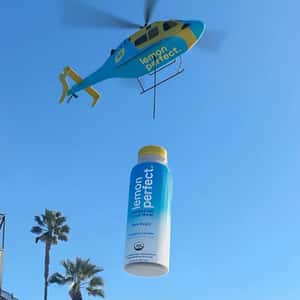Helicopter Drops Bottle in a fake-out-of-home ad of Lemon Perfect