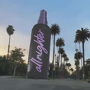 Setting Spray Stands Along Palm Trees in a fake-out-of-home ad of Urban Decay