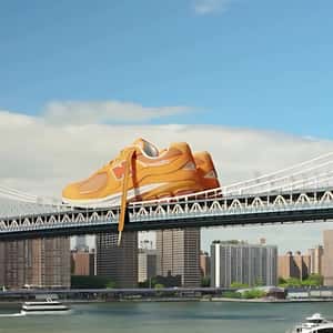 Sneakers Dropped on the Bridge in a fake-out-of-home ad of Foot Locker