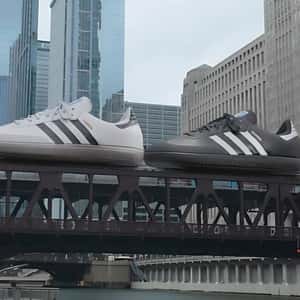 Sneakers Rides Above the Train in a fake-out-of-home ad of Foot Locker