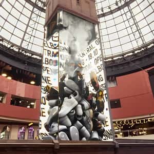 Tower Turned Shoes Claw Machine in a fake-out-of-home ad of Foot Locker