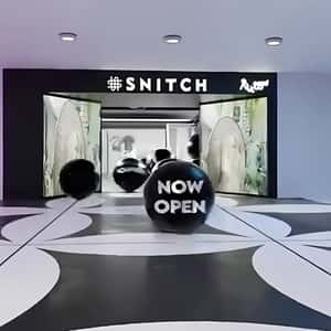 Black Balls Rolling Out From the Store in a fake-out-of-home ad of Snitch
