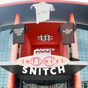 Shirts Float Out From Facade in a fake-out-of-home ad of Snitch