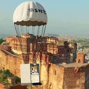 Parachute Drops Store in the City in a fake-out-of-home ad of Snitch