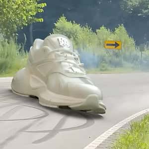 Running Shoes Racing in a fake-out-of-home of AMIRI