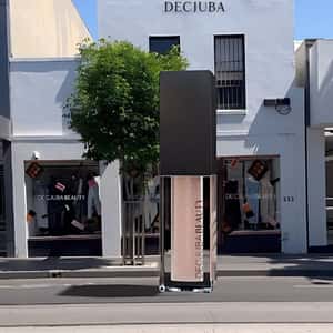 Liquid Eye Shadow Drops From the Sky in a fake-out-of-home-ad of DECJUBA