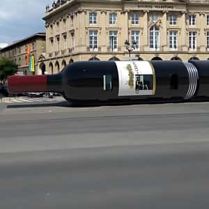 Wine Cruising on Tram Line in a fake-out-of-home-ad of Quoifaireabordeaux