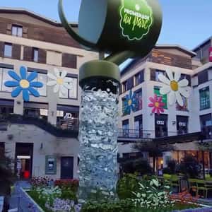 Flower Installations at Mall in a fake-out-of-home ad of Quoifaireabordeaux