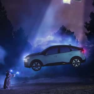 Alien Levitates Car From UFO in a fake-out-of-home ad of Citroën